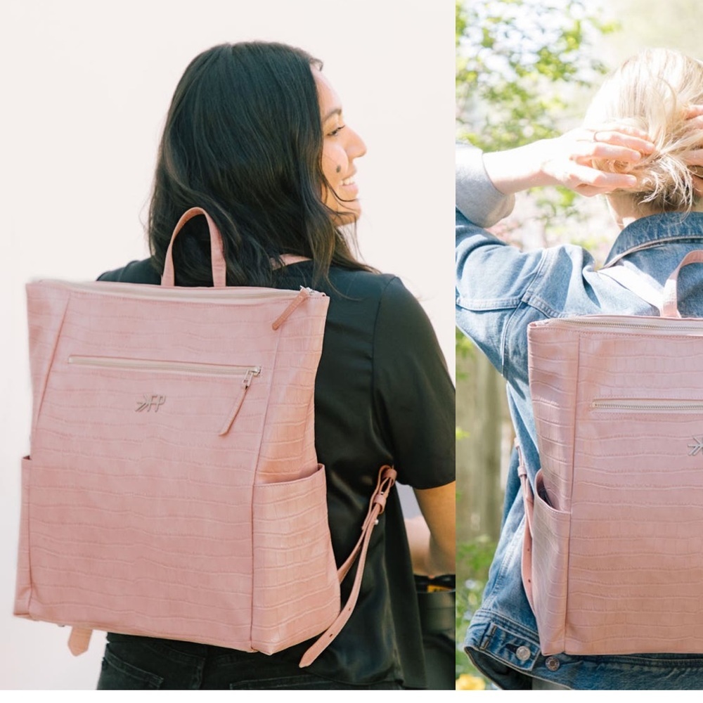 Minimal Water Resistant Faux
Leather Diaper Backpack